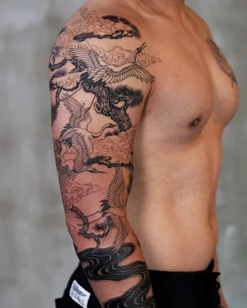 Japanese Blackwork cranes and pine trees full sleeve tattoo design for men