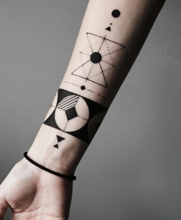 geometric forearm band tattoo draft showing varied line weight and clean negative space